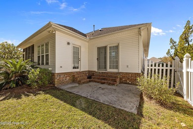 Welcome to **8887 Lansdowne Drive**, a beautiful home in the on Brunswick Plantation and Golf Resorts in North Carolina - for sale on GolfHomes.com, golf home, golf lot