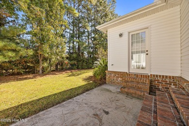 Welcome to **8887 Lansdowne Drive**, a beautiful home in the on Brunswick Plantation and Golf Resorts in North Carolina - for sale on GolfHomes.com, golf home, golf lot