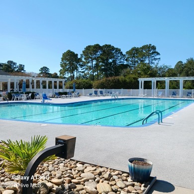 Welcome to **8887 Lansdowne Drive**, a beautiful home in the on Brunswick Plantation and Golf Resorts in North Carolina - for sale on GolfHomes.com, golf home, golf lot