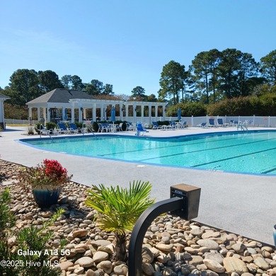 Welcome to **8887 Lansdowne Drive**, a beautiful home in the on Brunswick Plantation and Golf Resorts in North Carolina - for sale on GolfHomes.com, golf home, golf lot