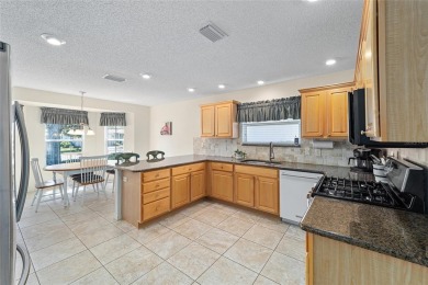 ***Great Price***NO BOND/OVERSIZED GARAGE!  This designer home on Glenview Championship Golf and Country Club in Florida - for sale on GolfHomes.com, golf home, golf lot