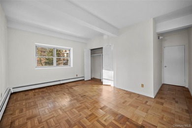 Commuter's dream! 1,200 square foot corner apartment with golf on Scarsdale Golf Club in New York - for sale on GolfHomes.com, golf home, golf lot