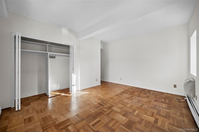 Commuter's dream! 1,200 square foot corner apartment with golf on Scarsdale Golf Club in New York - for sale on GolfHomes.com, golf home, golf lot