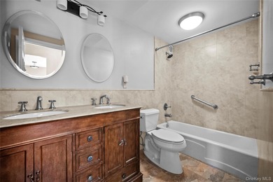 Commuter's dream! 1,200 square foot corner apartment with golf on Scarsdale Golf Club in New York - for sale on GolfHomes.com, golf home, golf lot