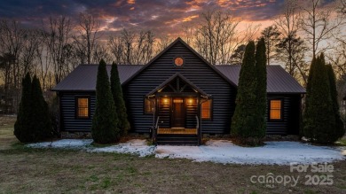 Tucked away in Maiden, this charming log cabin home sits on 1.41 on Glen Oaks Golf and Country Club in North Carolina - for sale on GolfHomes.com, golf home, golf lot