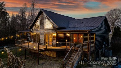 Tucked away in Maiden, this charming log cabin home sits on 1.41 on Glen Oaks Golf and Country Club in North Carolina - for sale on GolfHomes.com, golf home, golf lot