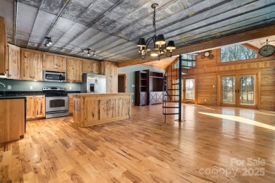 Tucked away in Maiden, this charming log cabin home sits on 1.41 on Glen Oaks Golf and Country Club in North Carolina - for sale on GolfHomes.com, golf home, golf lot