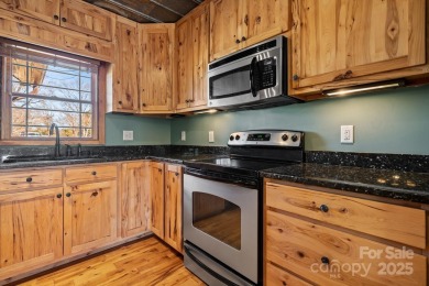 Tucked away in Maiden, this charming log cabin home sits on 1.41 on Glen Oaks Golf and Country Club in North Carolina - for sale on GolfHomes.com, golf home, golf lot