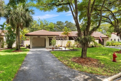 Recently updated and remodeled villa on the lake in Boca Lagoe on Boca Lago Golf and Country Club in Florida - for sale on GolfHomes.com, golf home, golf lot