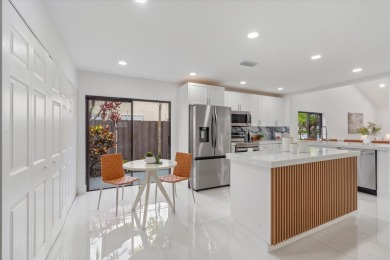 Recently updated and remodeled villa on the lake in Boca Lagoe on Boca Lago Golf and Country Club in Florida - for sale on GolfHomes.com, golf home, golf lot