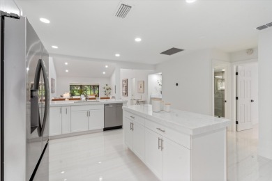 Recently updated and remodeled villa on the lake in Boca Lagoe on Boca Lago Golf and Country Club in Florida - for sale on GolfHomes.com, golf home, golf lot