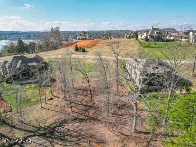 Embrace the luxury of lakeside living in WindRiver, a gorgeous on Wind River Golf Course in Tennessee - for sale on GolfHomes.com, golf home, golf lot