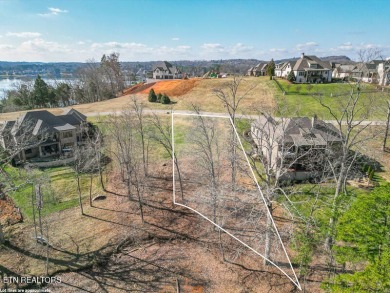 Embrace the luxury of lakeside living in WindRiver, a gorgeous on Wind River Golf Course in Tennessee - for sale on GolfHomes.com, golf home, golf lot