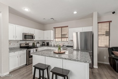 Beautiful and spacious 4-bedroom, 2.5-bath home located in the on Aguila Golf Course - Aguila in Arizona - for sale on GolfHomes.com, golf home, golf lot