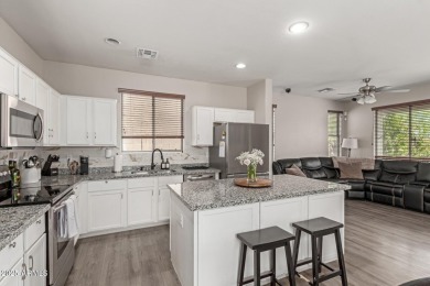 Beautiful and spacious 4-bedroom, 2.5-bath home located in the on Aguila Golf Course - Aguila in Arizona - for sale on GolfHomes.com, golf home, golf lot