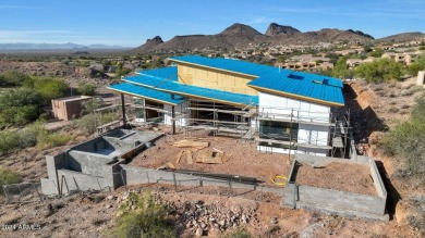 Contemporary new build designed for seamless indoor-outdoor on Eagle Mountain Golf Club in Arizona - for sale on GolfHomes.com, golf home, golf lot