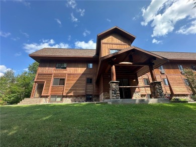 Cable, WI- Charming 2 BR, 2 BA top floor West end condo unit at on Lakewoods Forest Ridges Golf Club in Wisconsin - for sale on GolfHomes.com, golf home, golf lot