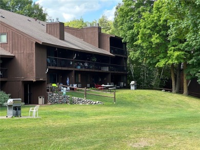 Cable, WI- Charming 2 BR, 2 BA top floor West end condo unit at on Lakewoods Forest Ridges Golf Club in Wisconsin - for sale on GolfHomes.com, golf home, golf lot