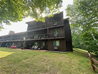 Cable, WI- Charming 2 BR, 2 BA top floor West end condo unit at on Lakewoods Forest Ridges Golf Club in Wisconsin - for sale on GolfHomes.com, golf home, golf lot