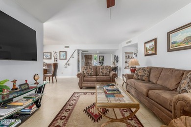 Home, sweet home! This charming 2-bedroom residence in Oakbrook on Westbrook Village Golf Club in Arizona - for sale on GolfHomes.com, golf home, golf lot