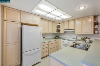 You'll love this rare level-in Carmel model featuring both a on Rossmoor Golf Course in California - for sale on GolfHomes.com, golf home, golf lot