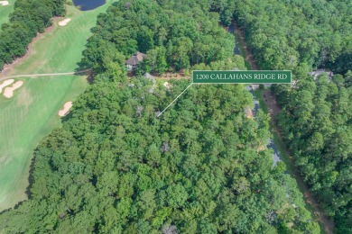 Located on the 6th fairway of the renowned National Golf Course on Reynolds Lake Oconee - The Oconee in Georgia - for sale on GolfHomes.com, golf home, golf lot