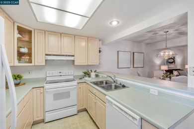 You'll love this rare level-in Carmel model featuring both a on Rossmoor Golf Course in California - for sale on GolfHomes.com, golf home, golf lot