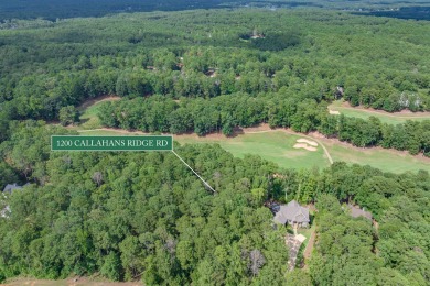 Located on the 6th fairway of the renowned National Golf Course on Reynolds Lake Oconee - The Oconee in Georgia - for sale on GolfHomes.com, golf home, golf lot