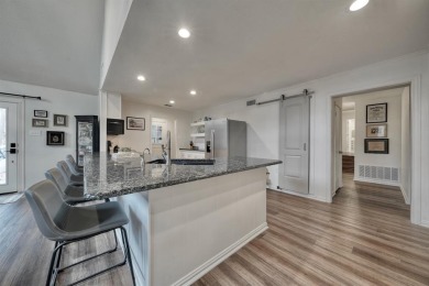 Stunningly remodeled Hideaway gem--now better than ever! on Hide-A-Way Lake Golf Course in Texas - for sale on GolfHomes.com, golf home, golf lot