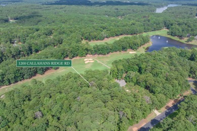 Located on the 6th fairway of the renowned National Golf Course on Reynolds Lake Oconee - The Oconee in Georgia - for sale on GolfHomes.com, golf home, golf lot