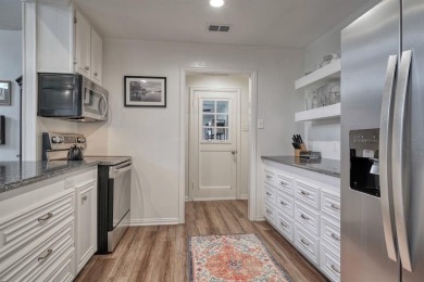 Stunningly remodeled Hideaway gem--now better than ever! on Hide-A-Way Lake Golf Course in Texas - for sale on GolfHomes.com, golf home, golf lot