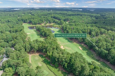 Located on the 6th fairway of the renowned National Golf Course on Reynolds Lake Oconee - The Oconee in Georgia - for sale on GolfHomes.com, golf home, golf lot