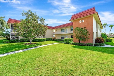 Light and bright 1BR/1.5BA corner unit in a 55+ development on The American Golf Club in Florida - for sale on GolfHomes.com, golf home, golf lot