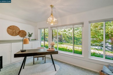 You'll love this rare level-in Carmel model featuring both a on Rossmoor Golf Course in California - for sale on GolfHomes.com, golf home, golf lot