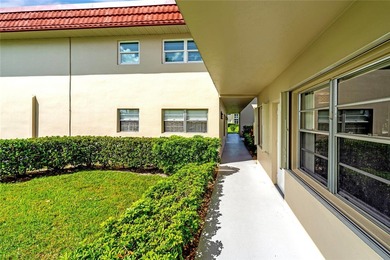 Light and bright 1BR/1.5BA corner unit in a 55+ development on The American Golf Club in Florida - for sale on GolfHomes.com, golf home, golf lot