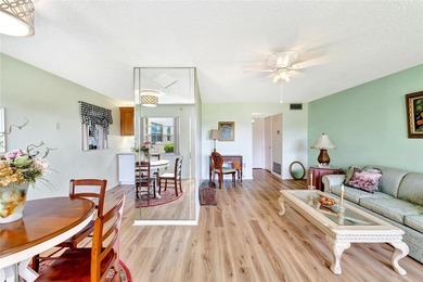 Light and bright 1BR/1.5BA corner unit in a 55+ development on The American Golf Club in Florida - for sale on GolfHomes.com, golf home, golf lot