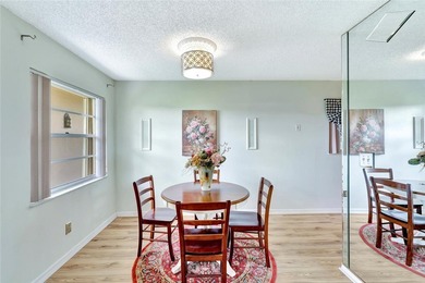Light and bright 1BR/1.5BA corner unit in a 55+ development on The American Golf Club in Florida - for sale on GolfHomes.com, golf home, golf lot