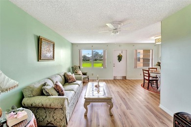 Light and bright 1BR/1.5BA corner unit in a 55+ development on The American Golf Club in Florida - for sale on GolfHomes.com, golf home, golf lot