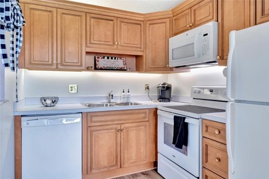 Light and bright 1BR/1.5BA corner unit in a 55+ development on The American Golf Club in Florida - for sale on GolfHomes.com, golf home, golf lot