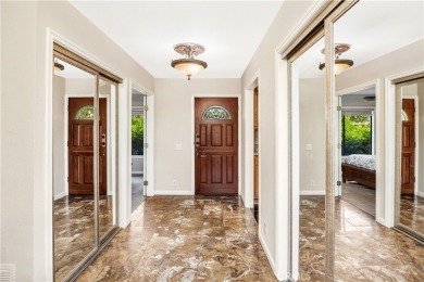 Rarely on the market, this one-of-a-kind single-level home is on Rancho San Joaquin Golf Course in California - for sale on GolfHomes.com, golf home, golf lot