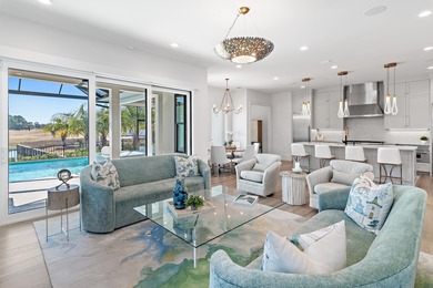 Located in Regatta Bay's newest community, Tradewinds, this on Regatta Bay Golf and Country Club in Florida - for sale on GolfHomes.com, golf home, golf lot