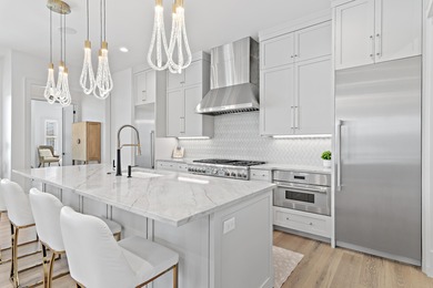 Located in Regatta Bay's newest community, Tradewinds, this on Regatta Bay Golf and Country Club in Florida - for sale on GolfHomes.com, golf home, golf lot