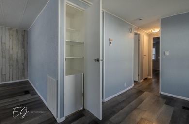 Meticulously restored home with state of the art kitchen. This on Spanish Lakes I in Florida - for sale on GolfHomes.com, golf home, golf lot