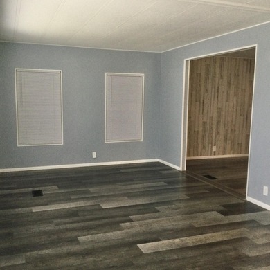 Meticulously restored home with state of the art kitchen.  This on Spanish Lakes I in Florida - for sale on GolfHomes.com, golf home, golf lot