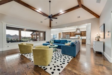 Stunning one story custom home that sits on the canal in The on The Golf Club at Resort Eagle Mountain Lake in Texas - for sale on GolfHomes.com, golf home, golf lot