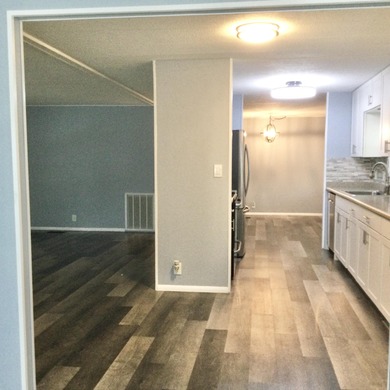 Meticulously restored home with state of the art kitchen.  This on Spanish Lakes I in Florida - for sale on GolfHomes.com, golf home, golf lot