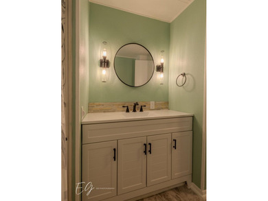 Meticulously restored home with state of the art kitchen. This on Spanish Lakes I in Florida - for sale on GolfHomes.com, golf home, golf lot