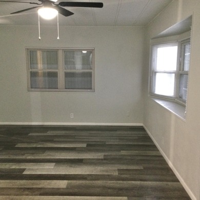 Meticulously restored home with state of the art kitchen.  This on Spanish Lakes I in Florida - for sale on GolfHomes.com, golf home, golf lot