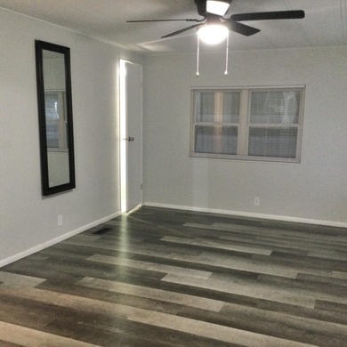 Meticulously restored home with state of the art kitchen.  This on Spanish Lakes I in Florida - for sale on GolfHomes.com, golf home, golf lot