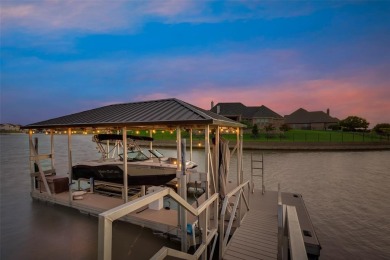 Stunning one story custom home that sits on the canal in The on The Golf Club at Resort Eagle Mountain Lake in Texas - for sale on GolfHomes.com, golf home, golf lot